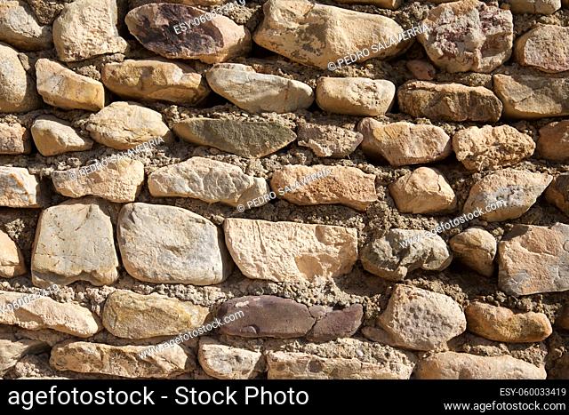 Stone wall background close up