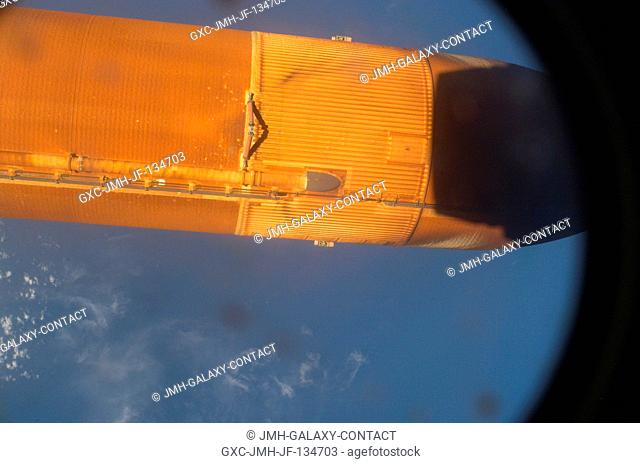This picture of the STS-121 external tank was photographed by a camera positioned in Discovery's umbilical well seconds after separation from the Space Shuttle...
