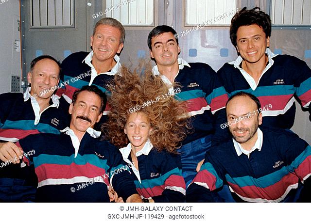 The seven crew members for the STS-46 mission pose for the traditional in-flight portrait onboard the Earth-orbiting space shuttle Atlantis