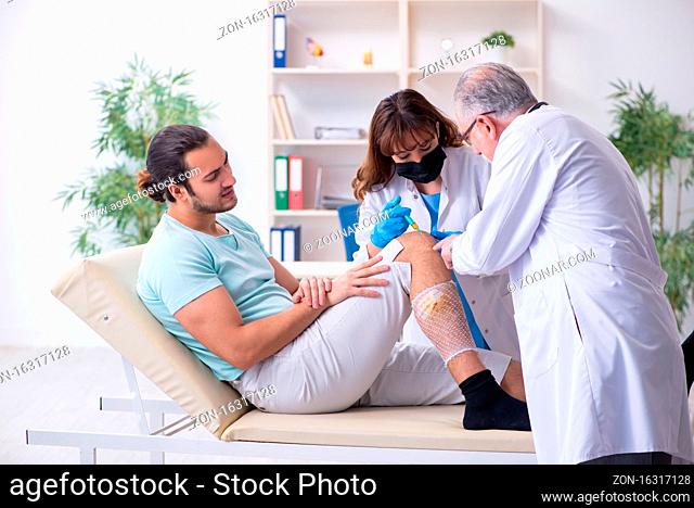 Young injured man in the hospital