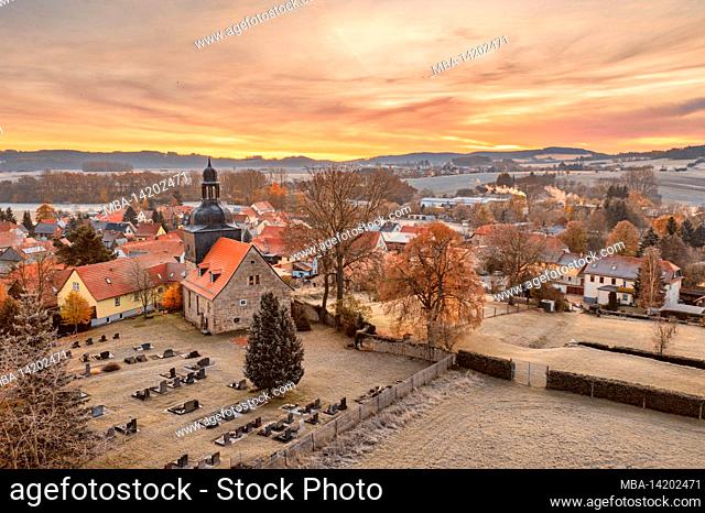 Germany, Thuringia, Stadtilm, district Griesheim, village church, cemetery, village, dawn, overview, back light