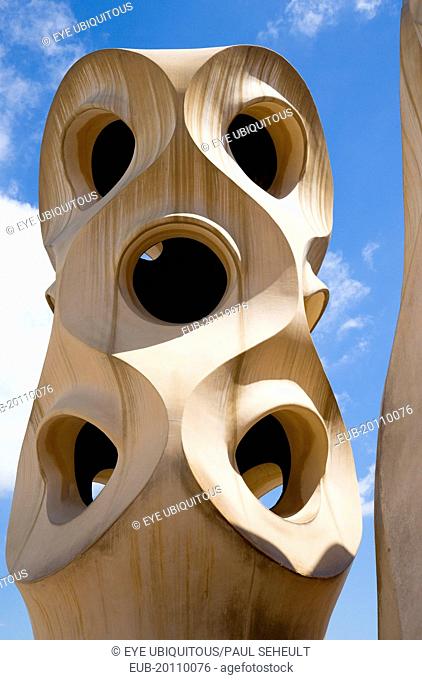 Chimneys and vents on the roof of Casa Mila apartment building known as La Pedrera or Stone Quarry designed by Antoni Gaudi in the Eixample district