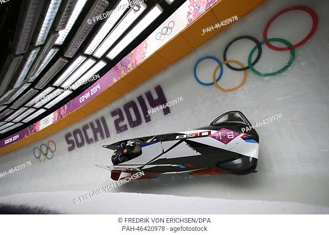 Pilot Steven Holcomb and Steven Langton of USA team 1 compete in the Two-man Heat 3 Bobsleigh event in Sliding Center Sanki at the Sochi 2014 Olympic Games