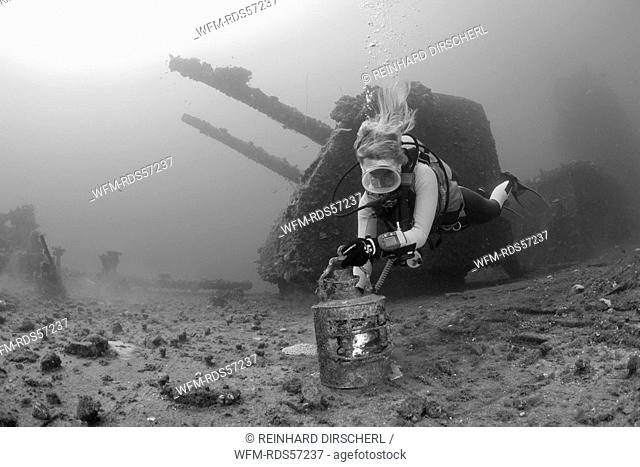 Diver finds Artifacts on Flight Deck of USS Saratoga, Bikini Atoll, Micronesia, Pacific Ocean, Marshall Islands