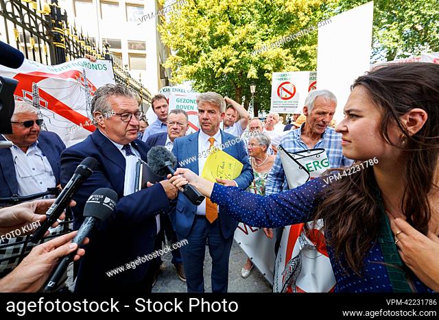 Brugge Mayor Dirk De Fauw and Oostkamp Mayor Jan De Keyser pictured during a protest action by local farmers against the Ventilus high-voltage network at the...