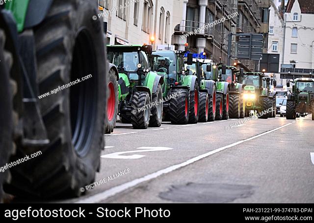 21 December 2023, Baden-Württemberg, Stuttgart: Farmers demonstrate with their tractors in Stuttgart city center against the federal government's agricultural...
