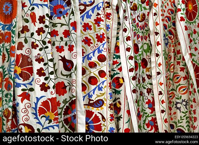 Traditional uzbek suzani embroidery fabrics at oriental bazaar, Bukhara, Uzbekistan