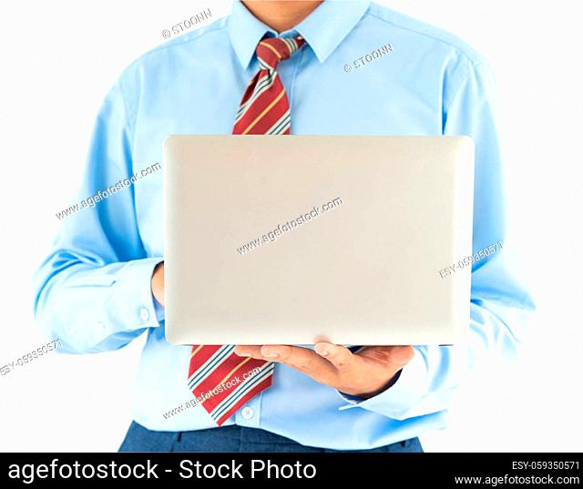 Businessman holding a laptop over white background with clipping path