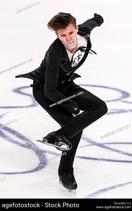 RUSSIA, CHELYABINSK - DECEMBER 21, 2023: Figure skater Yevgeny Semenenko performs his men's short programme as part of the 2024 Russian Figure Skating...