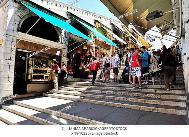 Tourists shopping inside the Rialto Bridge in Venice