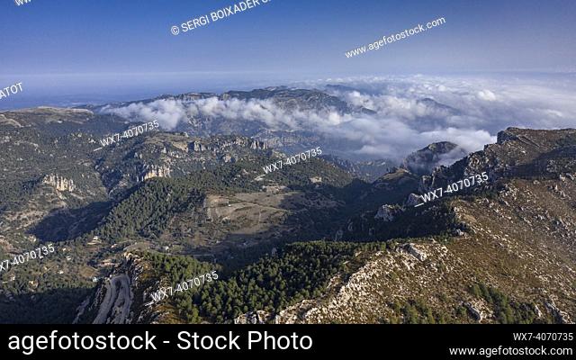 Aerial view of Mont Caro and the surrounding peaks of Els Ports - Los Puertos massif, a winter morning (Tarragona, Catalonia, Spain)
