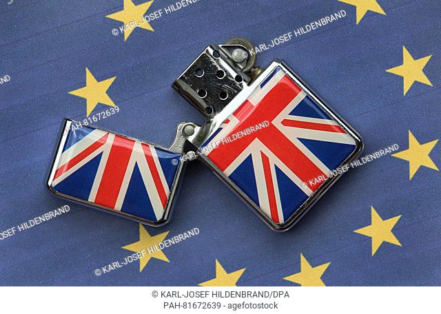 ILLUSTRATION - A lighter with the British flag printed on it lies on a European flag in Kempten, Germany, 29 June 2016. Photo: Karl-Joseph Hildenbrand/dpa |...