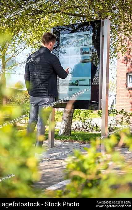 02 May 2022, Lower Saxony, Wangerland: An info monitor of the digital visitor management system. The aim of the system is to use sensors to measure the...
