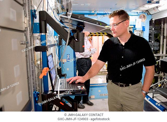 NASA astronaut Doug Wheelock, Expedition 24 flight engineer and Expedition 25 commander, participates in a training session in an International Space Station...