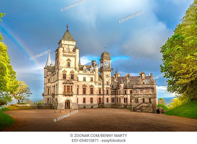 Spectacular rainbow in the dramatic sky at the scenic Dunrobin Castle in Scotland. Northern Highlands in Golspie, the east coast of Scotland, United Kingdom