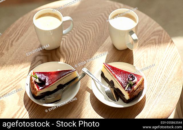 pieces of chocolate cake on wooden table