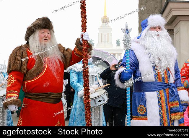 RUSSIA, MOSCOW - DECEMBER 10, 2023: Sook Irei (L), the Tuvan Father Frost, and Kodzyd Pol, the Komi Father Frost, attend a celebration of their birthdays during...