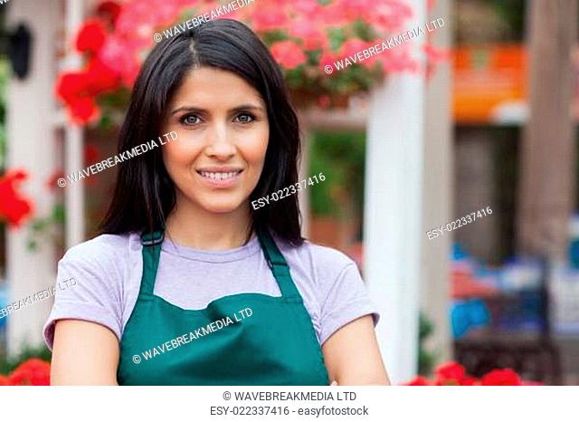 Portrait of smiling florist in garden centre
