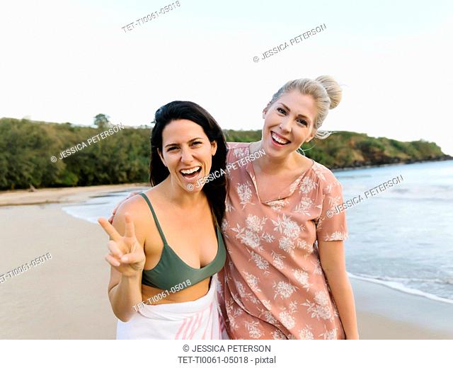 Smiling women on beach