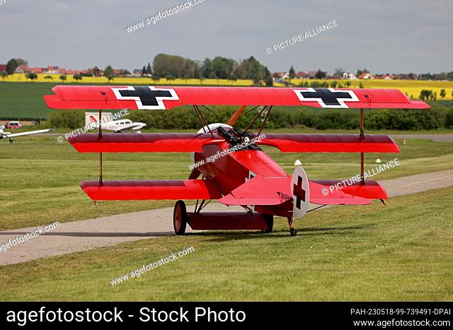 18 May 2023, Saxony-Anhalt, Ballenstedt: A pilot takes off with a faithful replica of Manfred von Richthofen's plane at Ballenstedt airfield