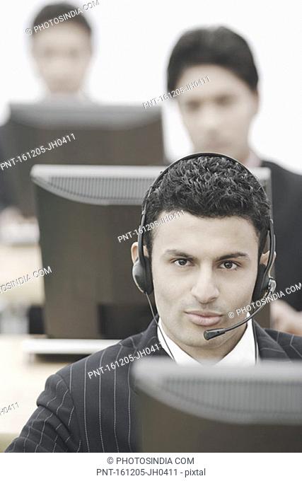 Portrait of a businessman wearing a headset