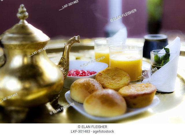 Moroccan breakfast with peppermint tea and orange juice, Riad Kaiss, Marrakech, Morocco, Africa