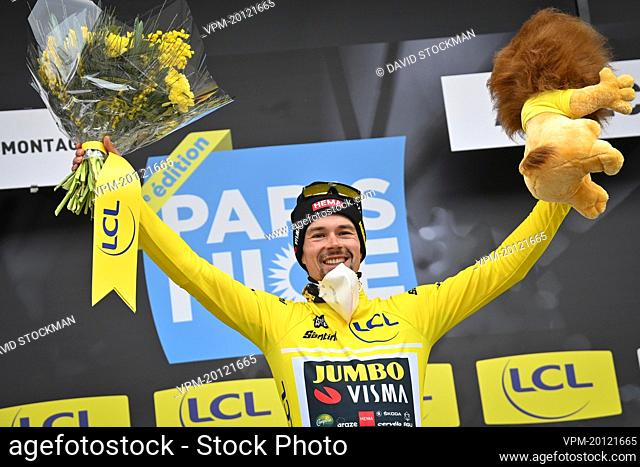 Slovenian Primoz Roglic of Jumbo-Visma celebrates on the podium in the yellow jersey of leader in the overall ranking after the fifth stage of 80th edition of...