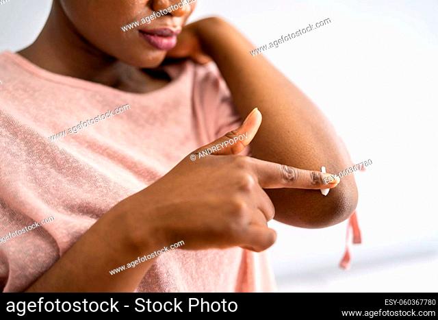 American African Woman Hand Care Cream To Skin