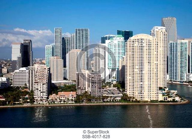 Aerial of Brickell Key Skyline in Miami from over Biscayne Bay