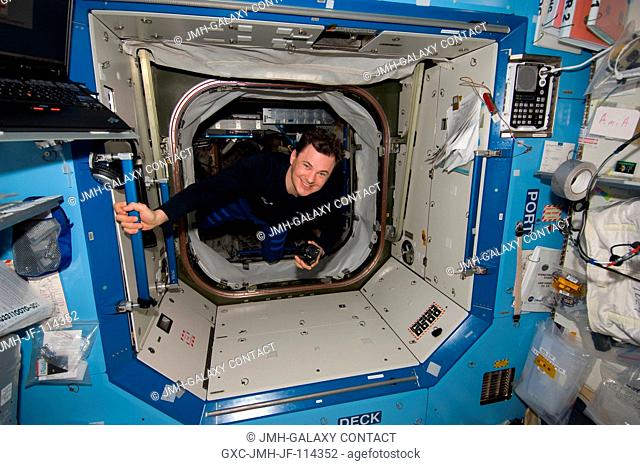 Cosmonaut Roman Romanenko, Expedition 2021 flight engineer, is pictured onboard the International Space Station on the eve of the undocking of the orbital...