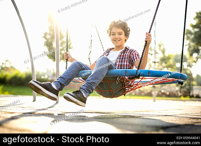cinematic image of children playing at the playground
