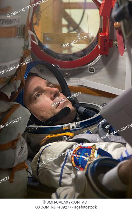 At the Baikonur Cosmodrome in Kazakhstan, Expedition 4041 Flight Engineer Reid Wiseman of NASA participates in a dress rehearsal fit check May 16 inside the...