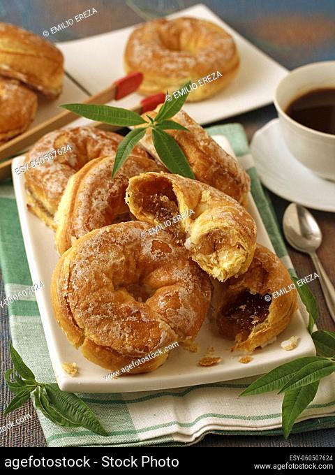 Puff pastry donuts stuffed with pumpkin jam