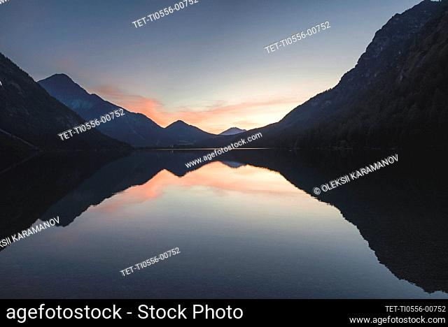 Austria, Plansee, Lake Heiterwanger in Austrian Alps in sunrise