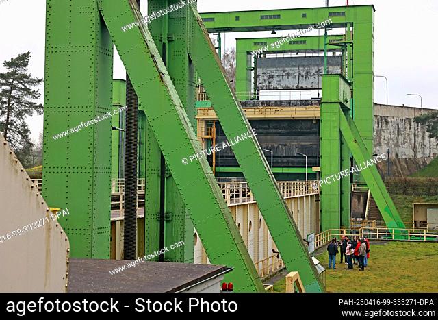 16 April 2023, Saxony-Anhalt, Magdeburg: Visitors tour the Magdeburg-Rothensee ship lift on the 13th Statewide Industrial Heritage Day