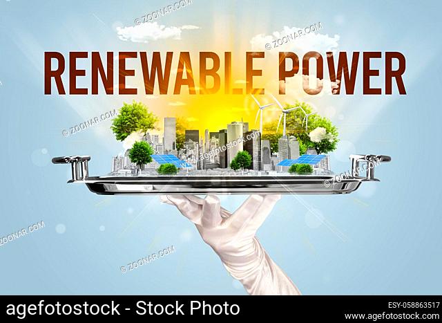 Waiter serving eco city with RENEWABLE POWER inscription, renewabke energy concept