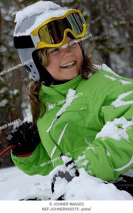 A girl with ski goggles