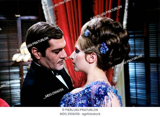 American singer and actress Barbra Streisand (Barbara Joan Streisand) and Egyptian actor Omar Sharif (Michel Demitri Shalhoub) going to kiss each other in the...