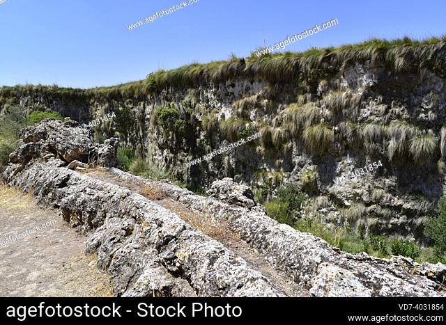 Aqueduct of Toril formed by travertine precipitated by the thermal waters that it transport. Alicún de las Torres, Granada, Andalusia, Spain