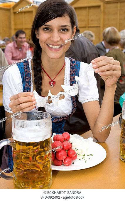 Woman with radishes & a litre of beer Oktoberfest, Munich