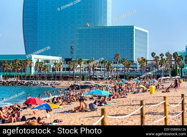 Barcelona, Spain - July 28 2020: People in the Barceloneta Beach after COVID 19 La Barceloneta in Barcelona, Spain