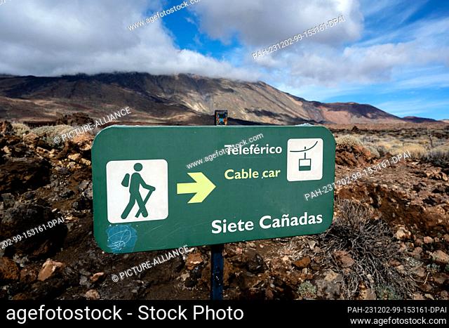 01 December 2023, Spain, La Orotava: A sign with the Spanish inscription ""Teléferico"" indicates the cable car to the summit in the national park on Mount...