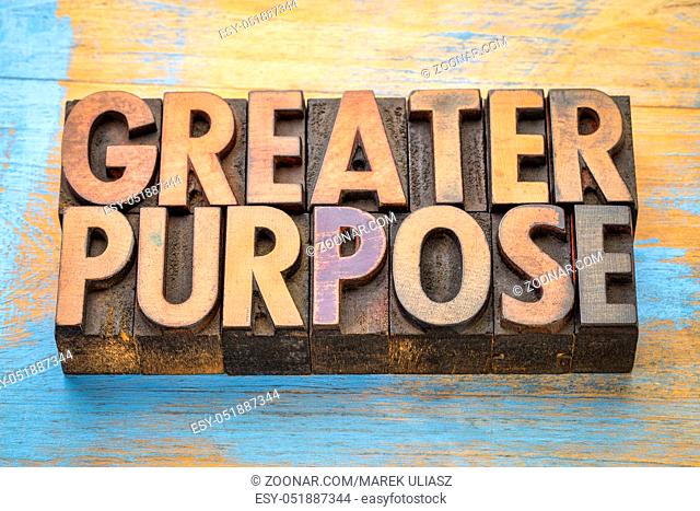 greater purpose - word abstract in vintage letterpress printing blocks with a cup of coffee