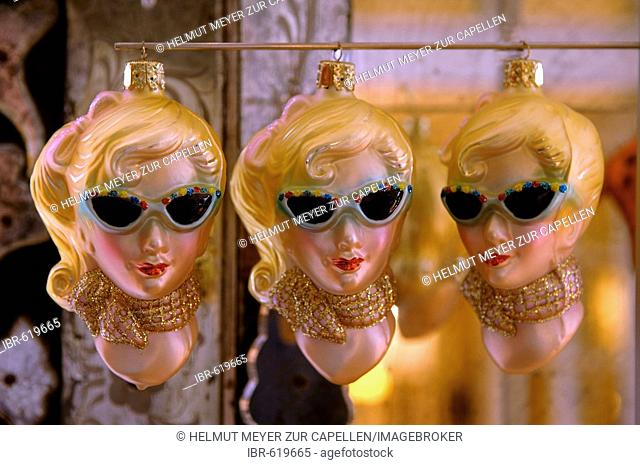 Retro ornaments from the 1950s, three blonde woman wearing sunglasses and scarf and red purse