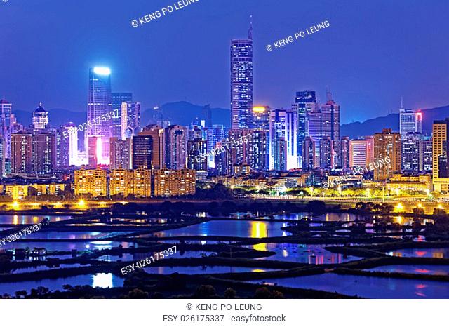 Shenzhen citscape at night , view from hiong kong countryside