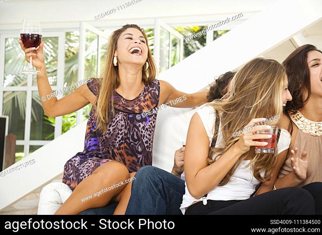 Women drinking cocktails