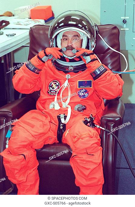 07/18/2001 -- Expedition Three crew member Mikhail Tyurin undergoes suit fit check as part of Terminal Countdown Demonstration Test activities