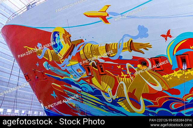 26 January 2022, Mecklenburg-Western Pomerania, Wismar: The image of an astronaut can be seen on the bow of the cruise ship ""Global Dream"" under construction...