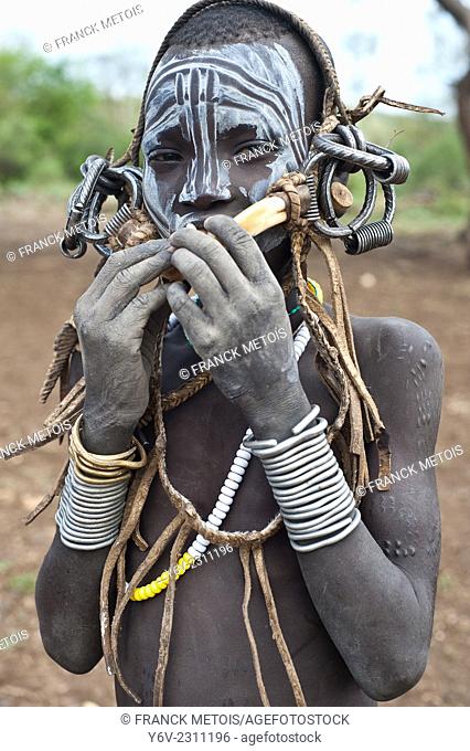 Boy belonging to the Mursi tribe. Omo valley ( Ethiopia)
