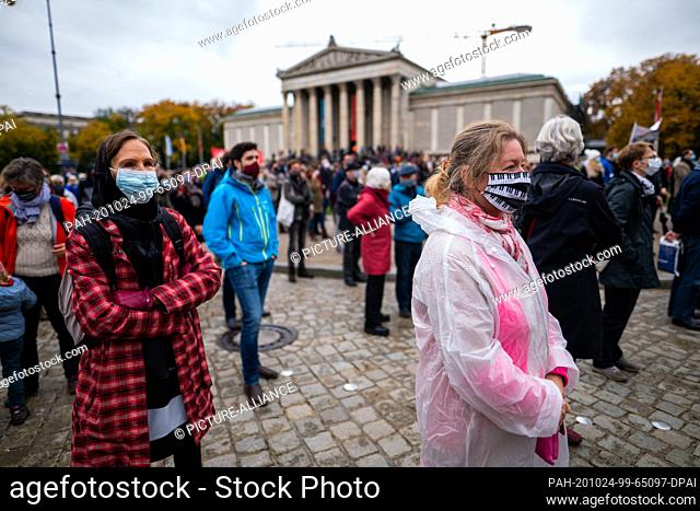 24 October 2020, Bavaria, Munich: Hundreds of people have gathered at Königsplatz for a demonstration. Under the motto ""Rising for Culture""